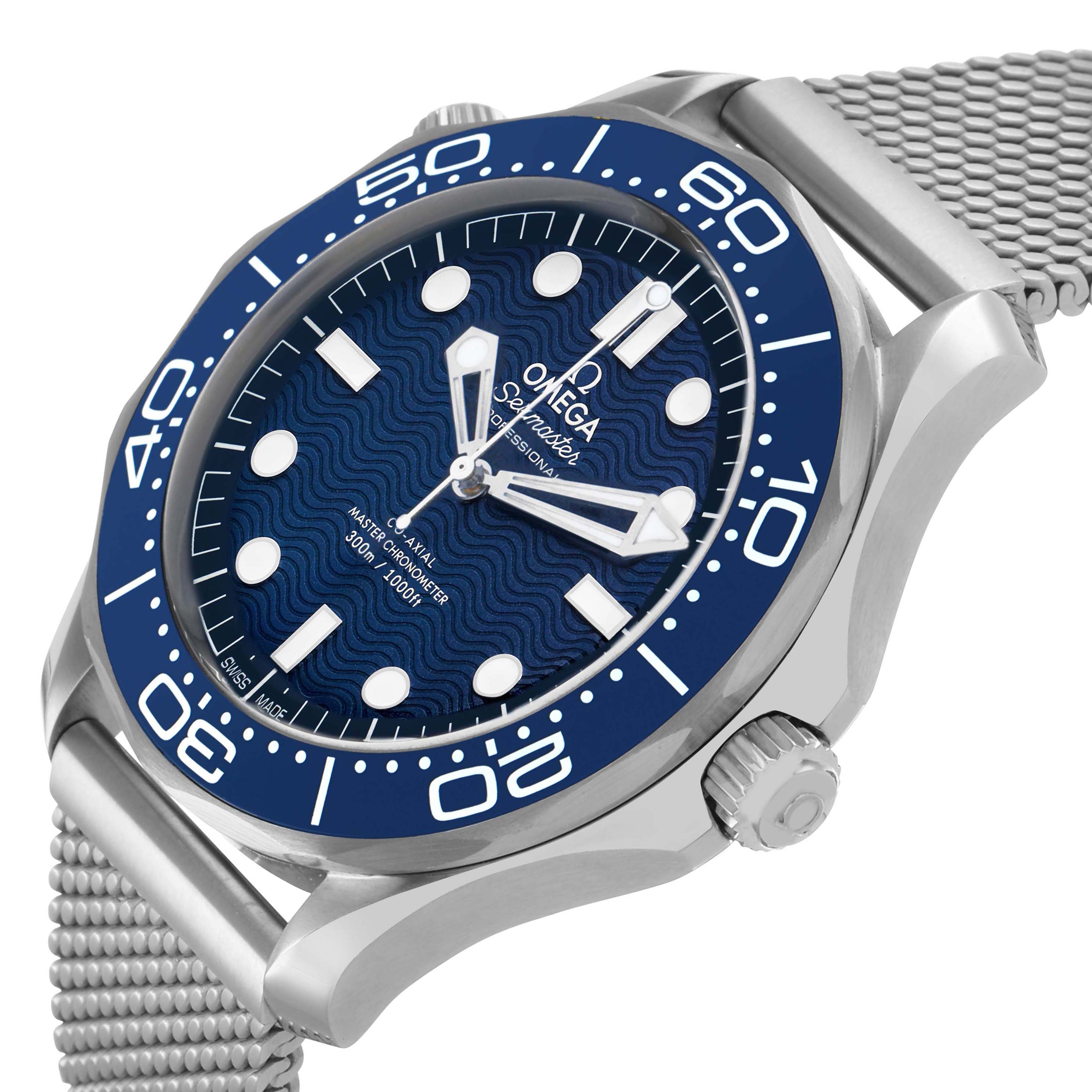 The Omega Seamaster 210.30.42.20.03.002 Men's Stainless Steel Blue Dial watch is shown at an angled side view, displaying the blue dial, bezel, and metal mesh bracelet.